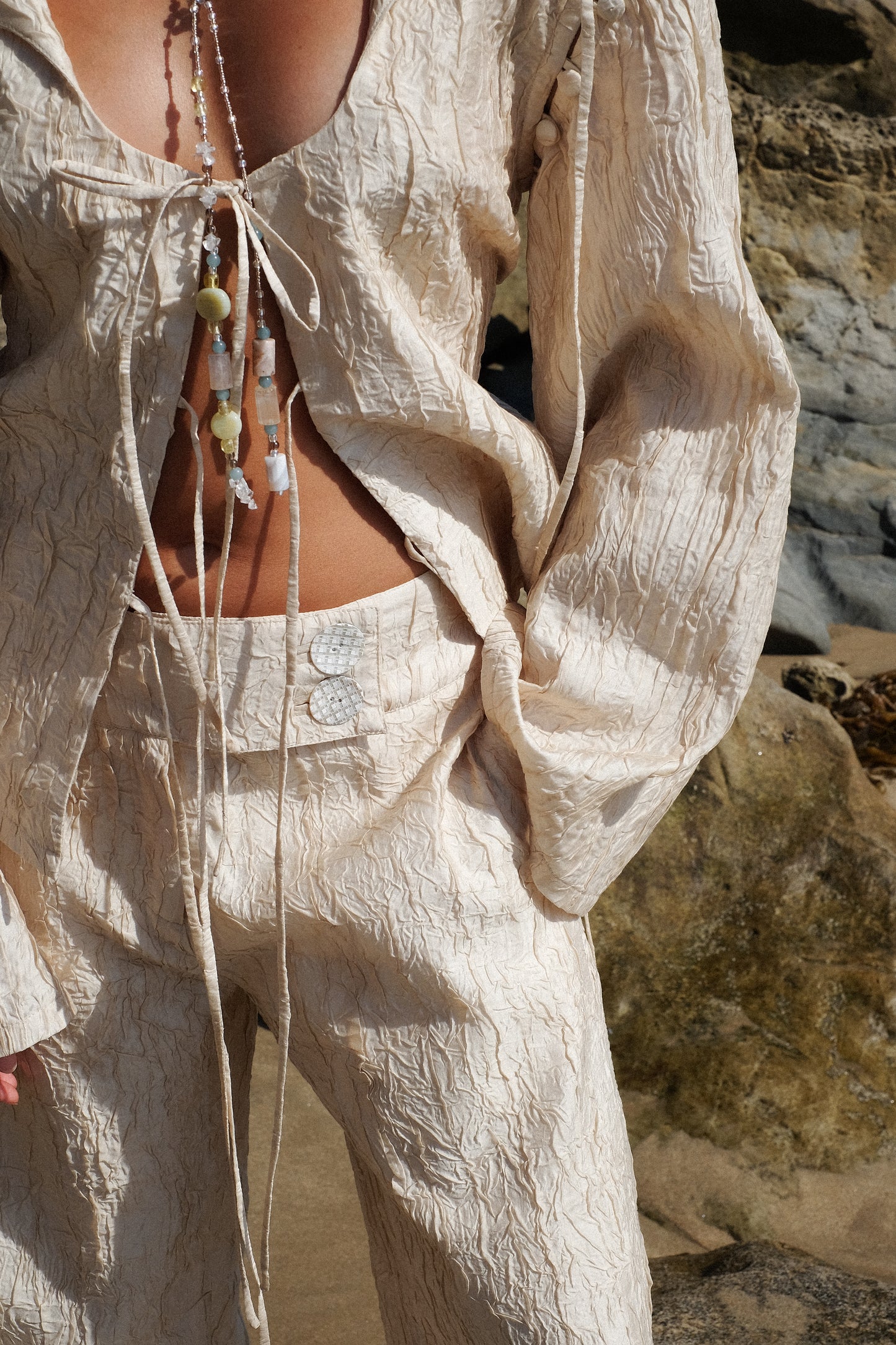 SKYE LOW WAISTED PANTS - CRINKLED CREME