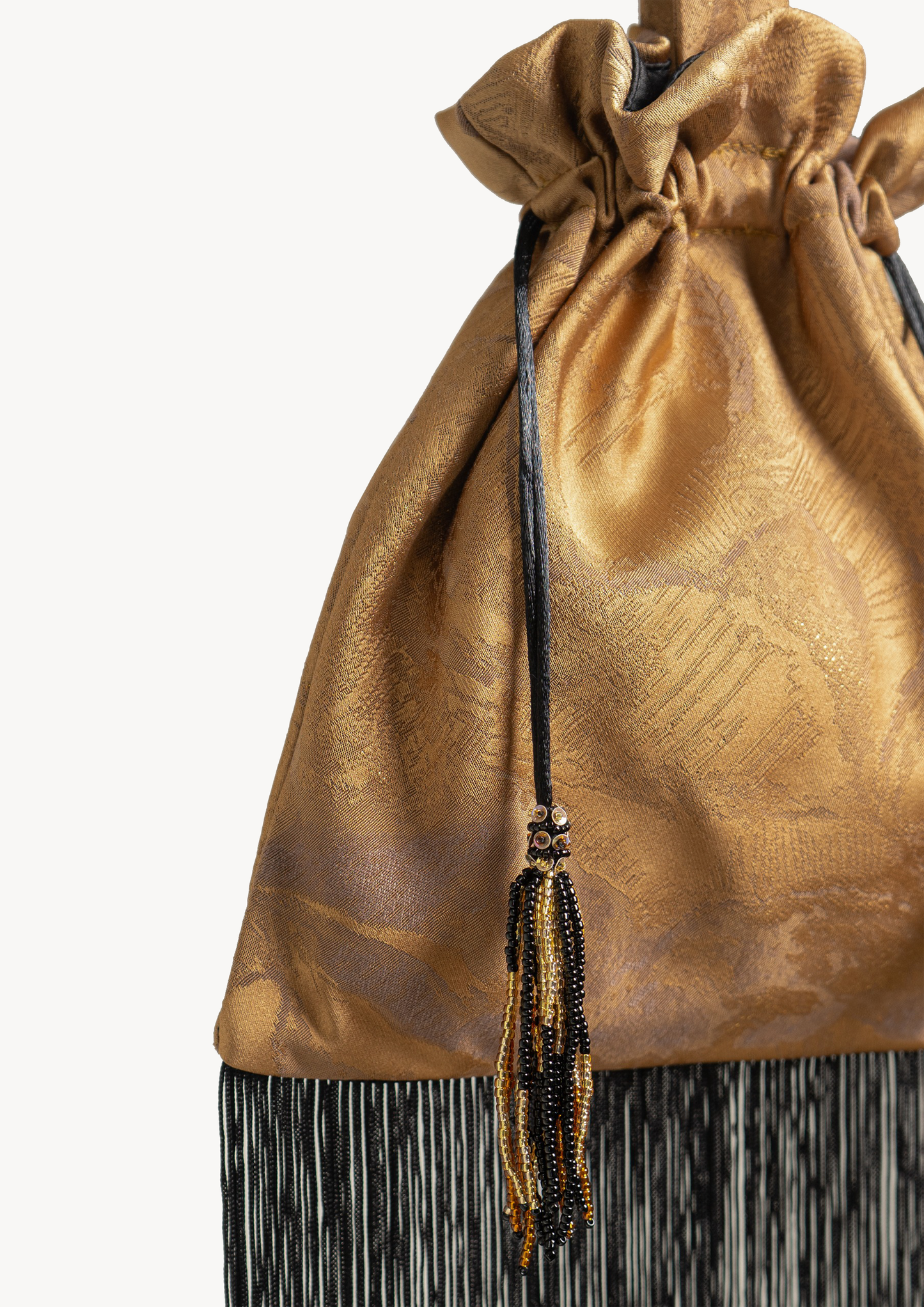 GOLD SMALL TASSEL BAG